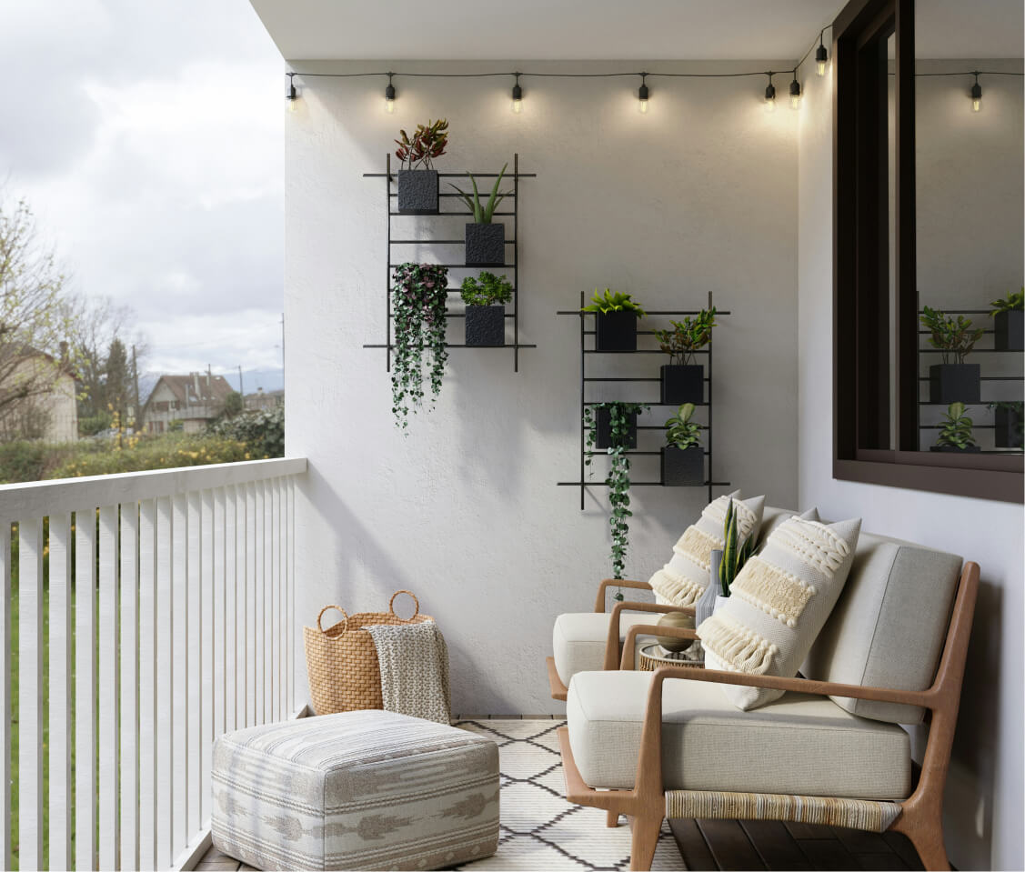 A balcony with furniture and plants on it.