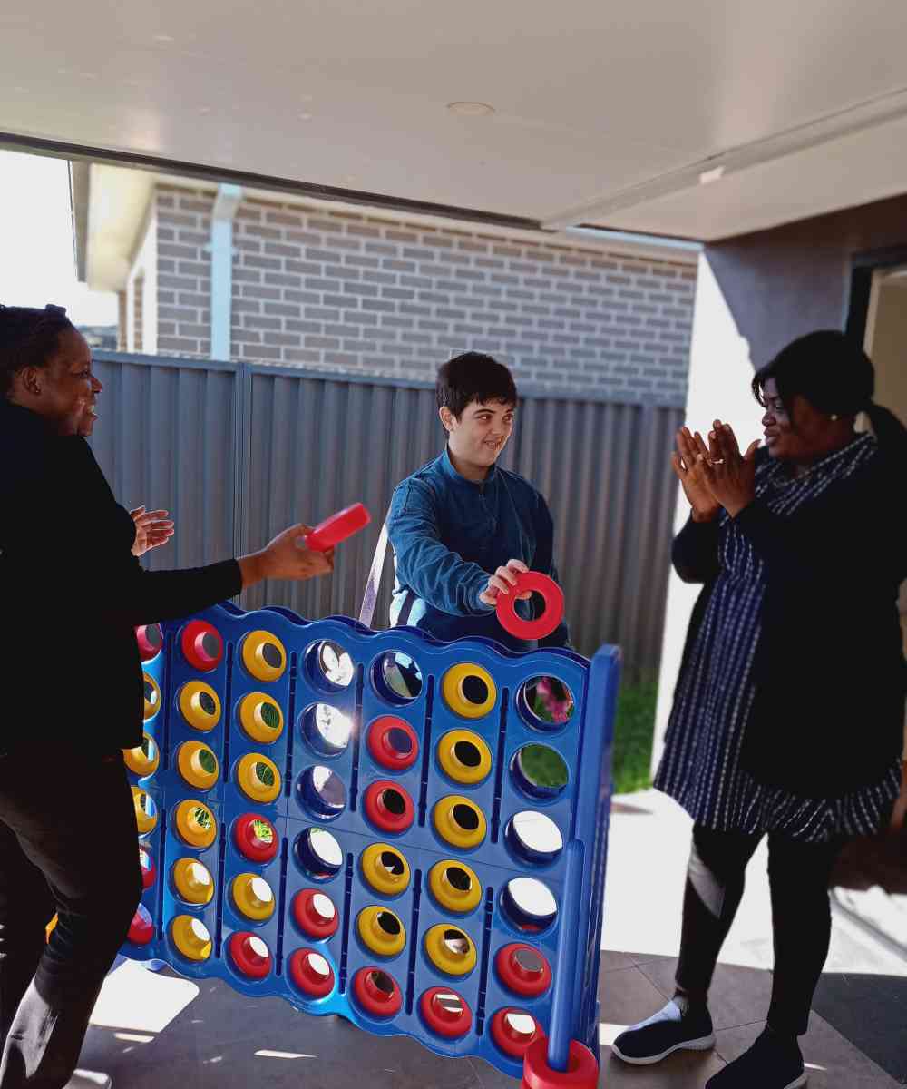 A group of people playing a game of connect - the-dots.